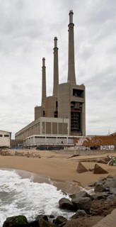 Decommissioned power station on the beach, three chimneys