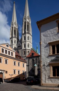 St Peter's Church, towers from south-west, on the right corner house Peterstraße 8, Hotel