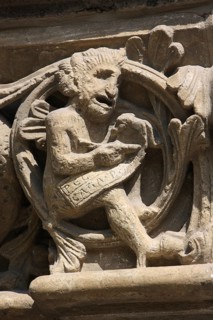 Romanesque capital on the west side of Paradise, Devil noting sins, St., Saint, Saint
