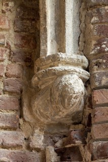 North wing of the cloister, console with nun depiction