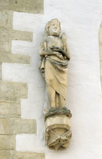 Christ figure on the north wall, exterior