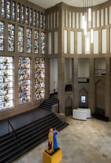 Central entrance hall with staircase and Jan Thorn-Prikkers leaded glass window mural