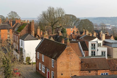 Roofs of historic buildings in Uphill area of city of Lincoln, Lincolnshire, England, UK