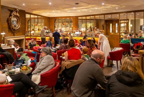 Interior White Hart Hotel, people sitting Colonnade bar and cocktail lounge, city of Lincoln,