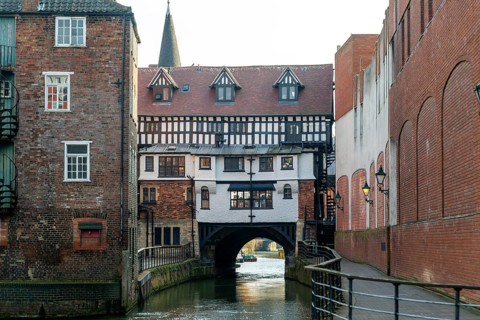 Timber framed buildings on historic High Bridge over River Witham, Lincoln, Lincolnshire, England,