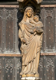Statue of Mary and baby Jesus in doorway, Cathedral Church of the Blessed Virgin Mary, Lincoln,