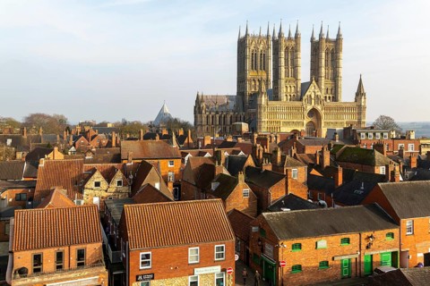 West frontage of Lincoln cathedral church viewed from castle walls, city of Lincoln, Lincolnshire,