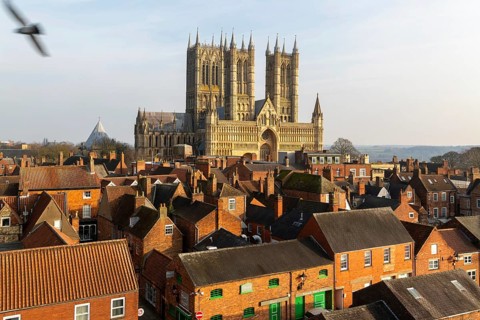 West frontage of Lincoln cathedral church viewed from castle walls, city of Lincoln, Lincolnshire,