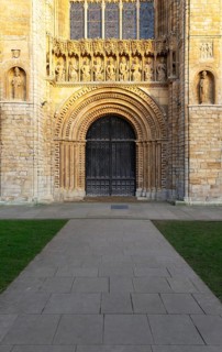 Carved stonework figures of kings, Gallery of Kings above doorway, frontage of cathedral church,