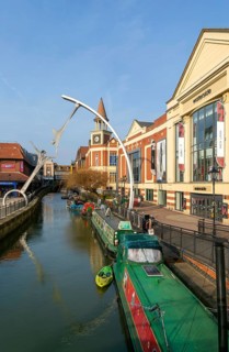 Narrow boats River Witham waterside shopping centre, Lincoln, Lincolnshire, England, UK -