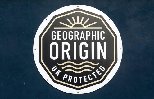 Geographic origin sign for Grimsby smoked fish, Grimsby docks, north east Lincolnshire, England, UK