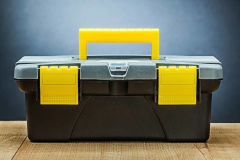 Closed tool boox on wood boards
