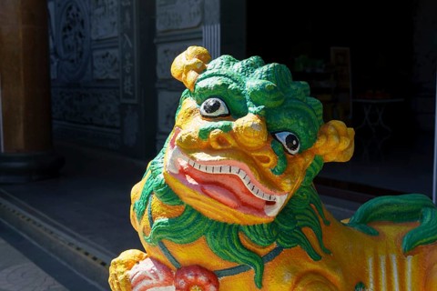 Colourful lion sculpture in temple, radiating energy and artistry, penang, malaysia