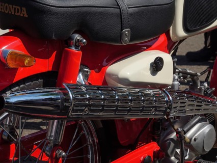 Red retro motorbike with chrome-coloured exhaust and black seat, Appelhülsen, münsterland, germany