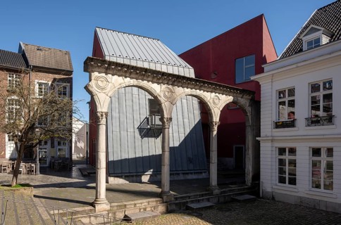 Aachen, courtyard with reconstructed Roman portico and modern buildings