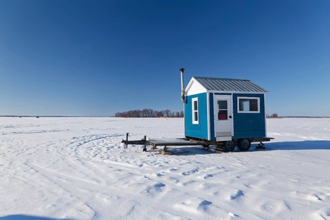 Winter, ice fishing hut on the Saint Lawrence River, Province of Quebec, Canada, North America