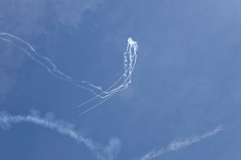 Airshow, glider contrails against blue sky, Montreal, Province of Quebec, Canada, North America