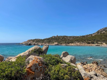 View of coast with rocks and clear blue water, cagliari, sardinia, italy