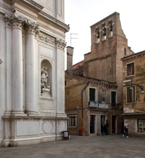 Italy Venice Campo San Rocco -186 Church of San Rocco 18th century façade detail right bell gable