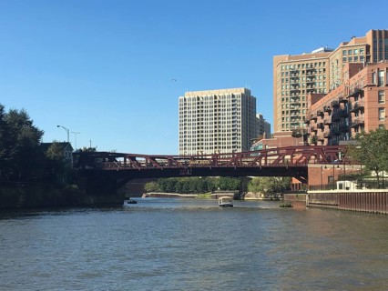 Urban environment with bridge and modern buildings along a river in sunshine, chicago, illinois,