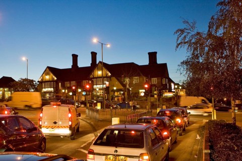 Traffic at Junction at twilight Harrow Middlesex, UK United Kingdom England