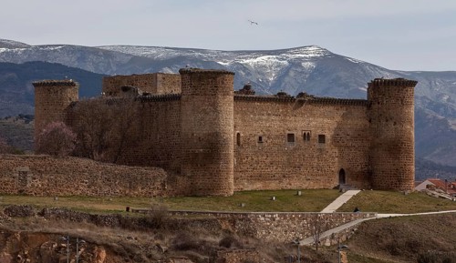 Castillo de Valdecorneja from the north behind the Sierra de Gredos