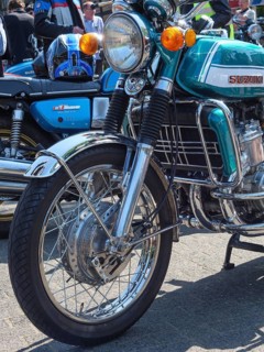 Retro Suzuki motorbike with silver and chrome-coloured elements on the road, Appelhülsen,