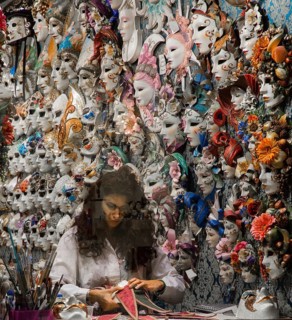Italy Venice Mask maker -231 in her workshop surrounded by her products