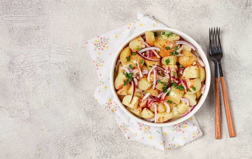 Boiled potato salad with red onion, German cuisine, homemade, no people