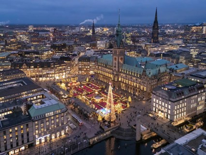 Aerial view of the Christmas market on Rathausplatz at Hamburg City Hall during the blue hour,