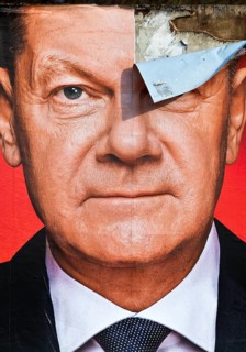 Partially destroyed large poster for the 2025 federal election by the SPD with Olaf Scholz, Witten,