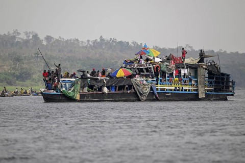 Overloaded ferry on the Congo River, near Tshumbiri, Mai-Ndombe Province, Democratic Republic of