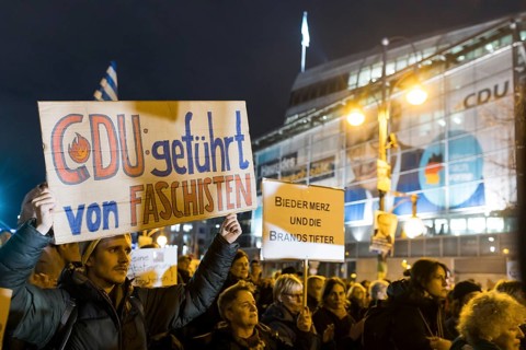 Signs CDU led by fascists and Bieder Merz and the arsonists (in reference to Biedermann and the