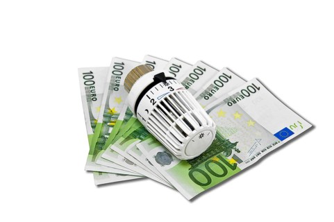 Symbolic photo of energy costs, heating valve with euro banknotes Studio, Baden-Württemberg,