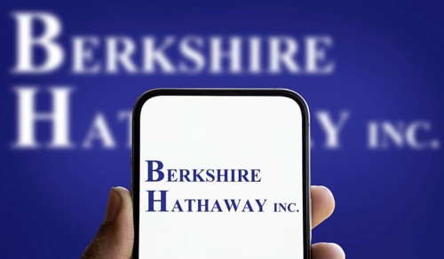 Berkshire Hathaway inc logo is displayed on smartphone. Berkshire Hathaway Inc is an American