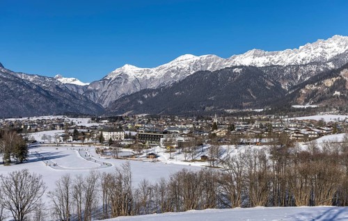 Winter panorama, Saalfelden am Steinernen Meer, Salzburg, ice skating on Lake Ritzensee