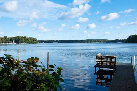 View over the Scharmützelsee with a jetty in the foreground, Bad Saarow, Brandenburg, Germany,