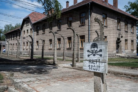 The sign with the word Stop in German and Polish in the German nazi concentration camp Auschwitz