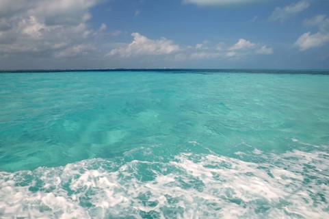 Caribbean blue turquoise sea water color from boat view