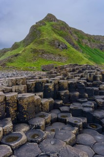 A vertical view of the many volcanic basalt columns of the Giant's Causeway in Northern Ireland