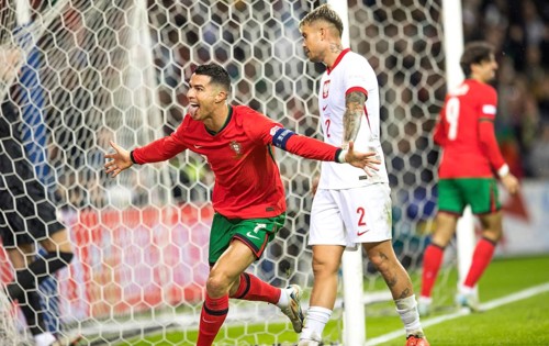 Football match, it is minute 87 Cristiano RONALDO CR7 Portugal with tongue outstretched and beaming