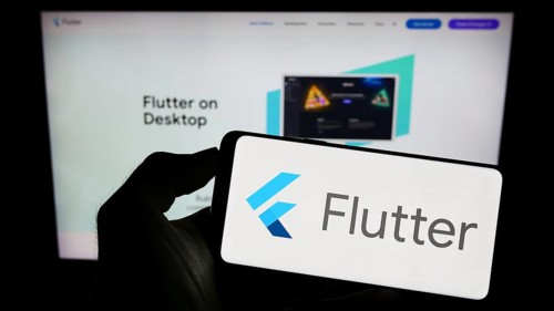 Stuttgart, Germany, 07-09-2023: Person holding cellphone with logo of UI software development kit