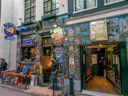 A heavily decorated, painted coffeeshop in the red light district of the historic city centre,