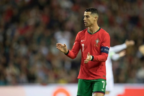 Football match, captain Cristiano RONALDO CR7 Portugal with captain's armband clapping his hands