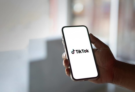 Tik Tok logo on smartphone