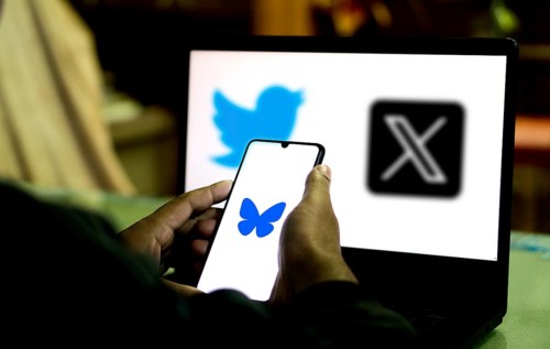 Bluesky logo is displayed on smartphone and X (twitter) logo on the background.