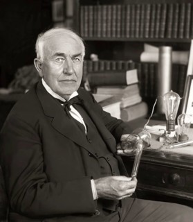 Thomas Alva Edison with his lightbulb, digitally edited