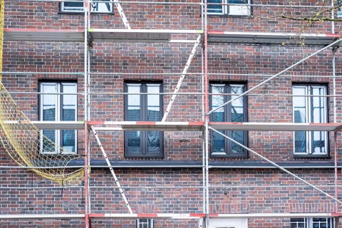 House construction site with scaffolding