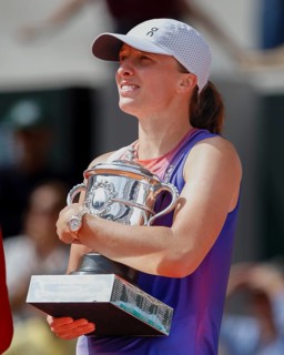 French Open 2024 Champion Iga Swiatek of Poland is holding the trophy at Roland Garros, Paris,
