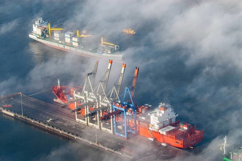 Aerial view of a container ship of the shipping company Hamburg Süd the Monte Olivia at the